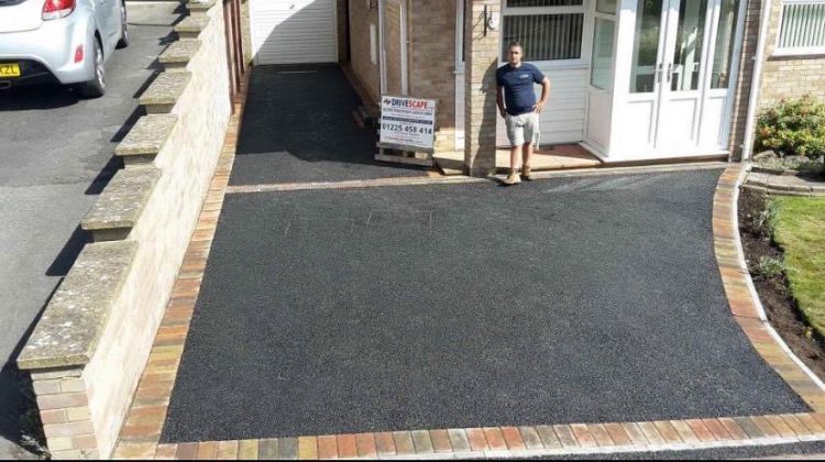 Tarmac driveway with buff block edging at a Trowbridge home